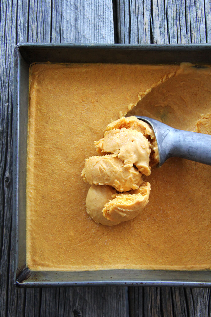 Scooping pumpkin ice cream