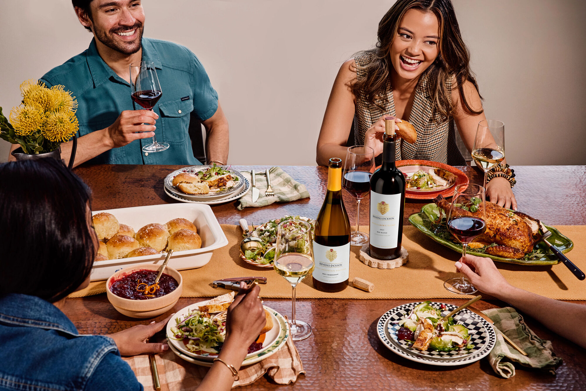 Friends enjoying a Thanksgiving feast with Kendall-Jackson wines