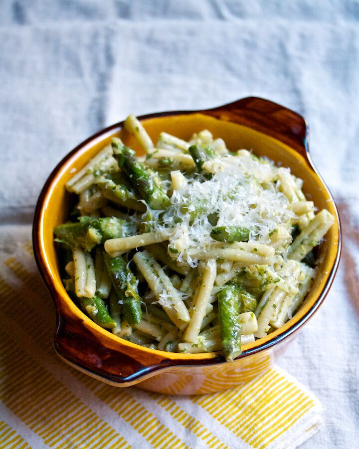 Gemelli Pasta with cheese on top in a ceramic pot