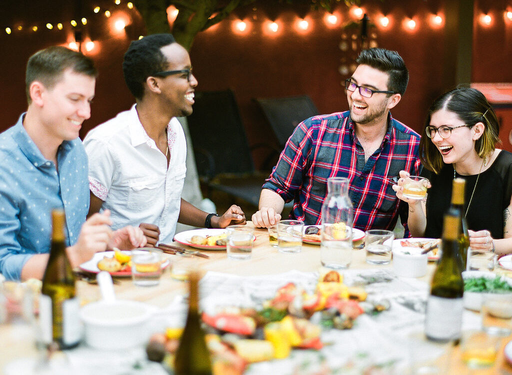 Friends enjoying a seafood boil outside