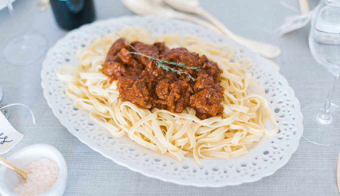 Red Wine & Sausage Bolognese on a plate with Kendall-Jackson wine