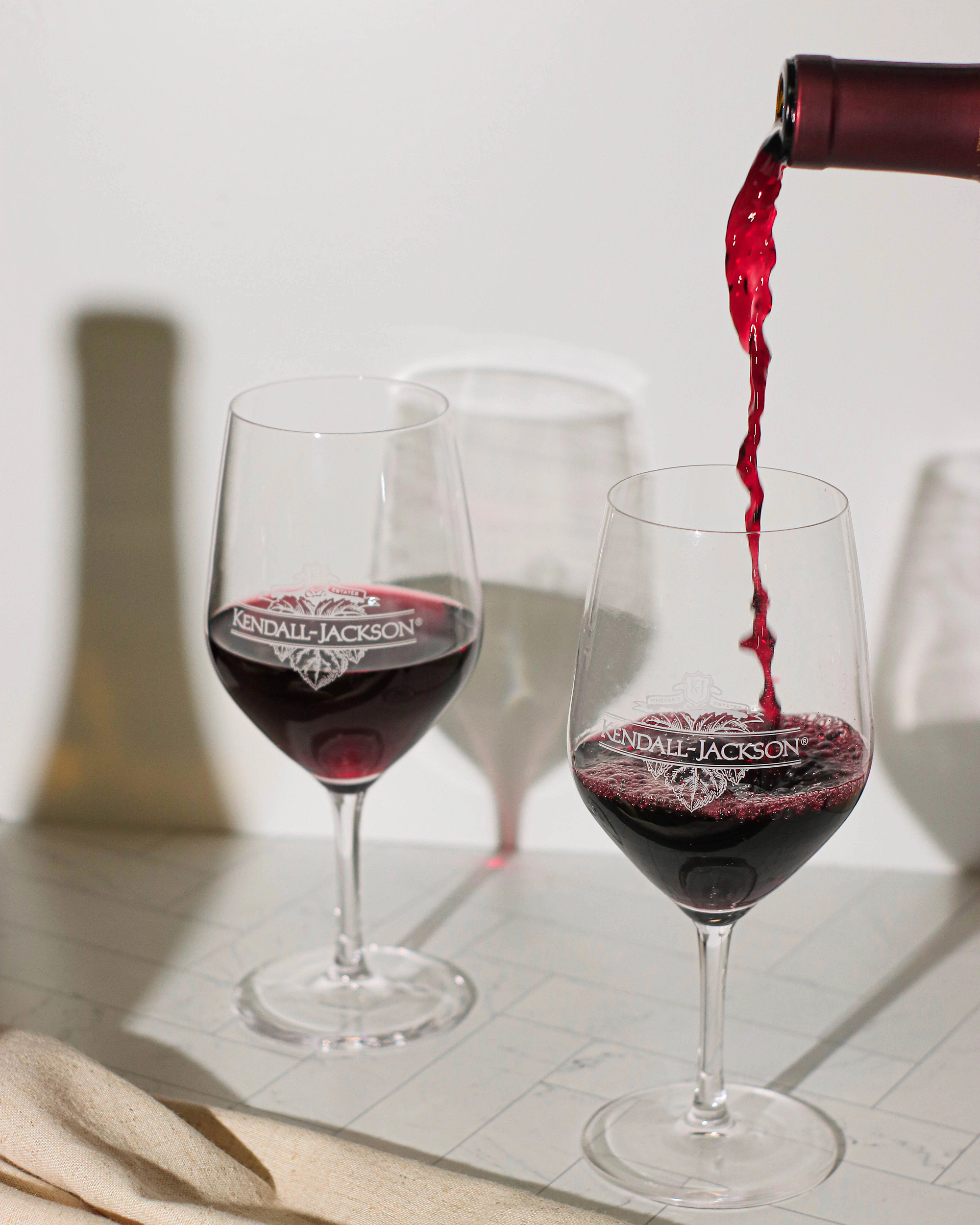 Pouring red wine in a glass