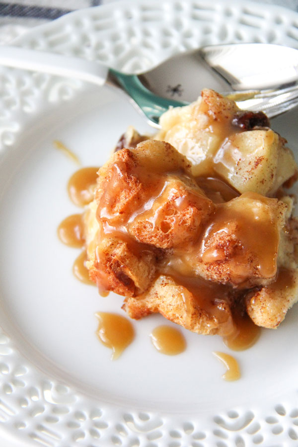 Bread puddings are so rich and creamy making them a delicious as a stand alone dish, but adding tart apples to the mix takes this Apple Bread Pudding with Caramel Sauce recipe to the next level.