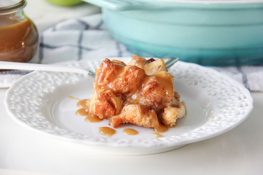 Bread puddings are so rich and creamy making them a delicious as a stand alone dish, but adding tart apples to the mix takes this Apple Bread Pudding with Caramel Sauce recipe to the next level.