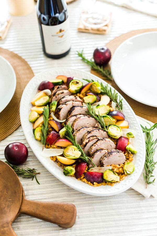 Enjoy the flavors of fall with this grilled pork loin, served over a bed of farro with&nbsp;roasted harvest vegetables and ripe plums.