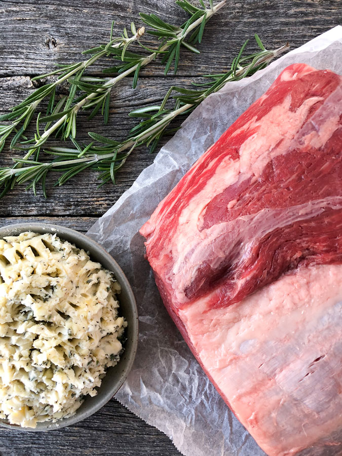 This Prime Rib with a Rosemary Garlic Butter Rub is perfect holiday dinner to serve up for your Christmas or New Years Eve celebration!
