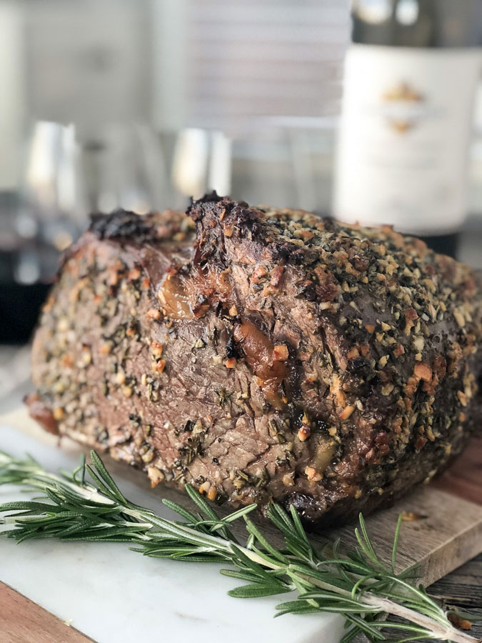 This Prime Rib with a Rosemary Garlic Butter Rub is perfect holiday dinner to serve up for your Christmas or New Years Eve celebration!