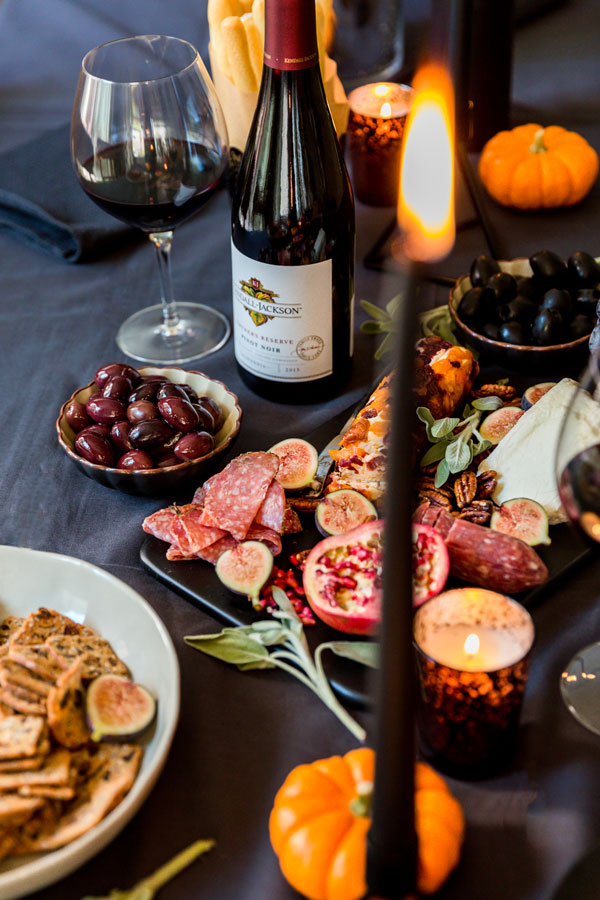 Between the witches, goblins and bats there’s still plenty of fun in a bottle of wine and a decadent, Spooky Halloween Wine &amp; Cheese Board for your friends.