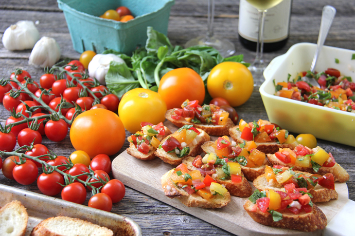 Bruschetta is one of the easiest and quickest appetizers to make!  You can have this Tomato Basil Bruschetta recipe made and ready to serve in less than 30 minutes, so it's great for last minute get-togethers and large crowds.