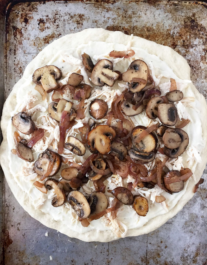 And not just any pizza, this is a recipe for White Pizza with Chicken, Mushrooms and Mozzarella. A recipe that is perfect served up with a glass of&nbsp;Kendall-Jackson Vintner’s Reserve&nbsp;Chardonnay.