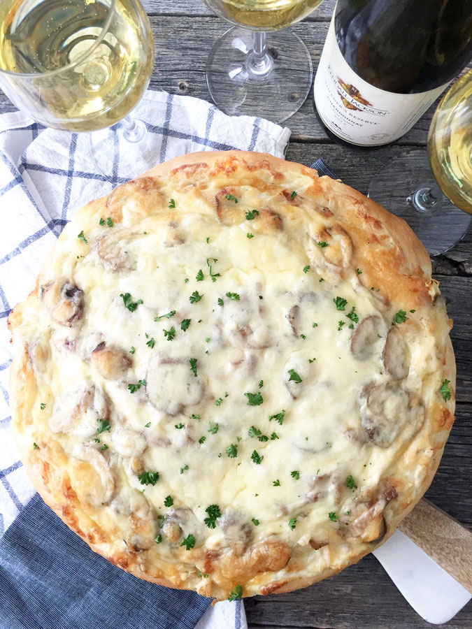 And not just any pizza, this is a recipe for White Pizza with Chicken, Mushrooms and Mozzarella. A recipe that is perfect served up with a glass of&nbsp;Kendall-Jackson Vintner’s Reserve&nbsp;Chardonnay.