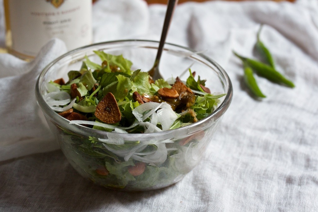 Thai Herb Salad for summer eating, a recipe for one, made more delicious with a spicy dressing, fried cashews, and crispy garlic.