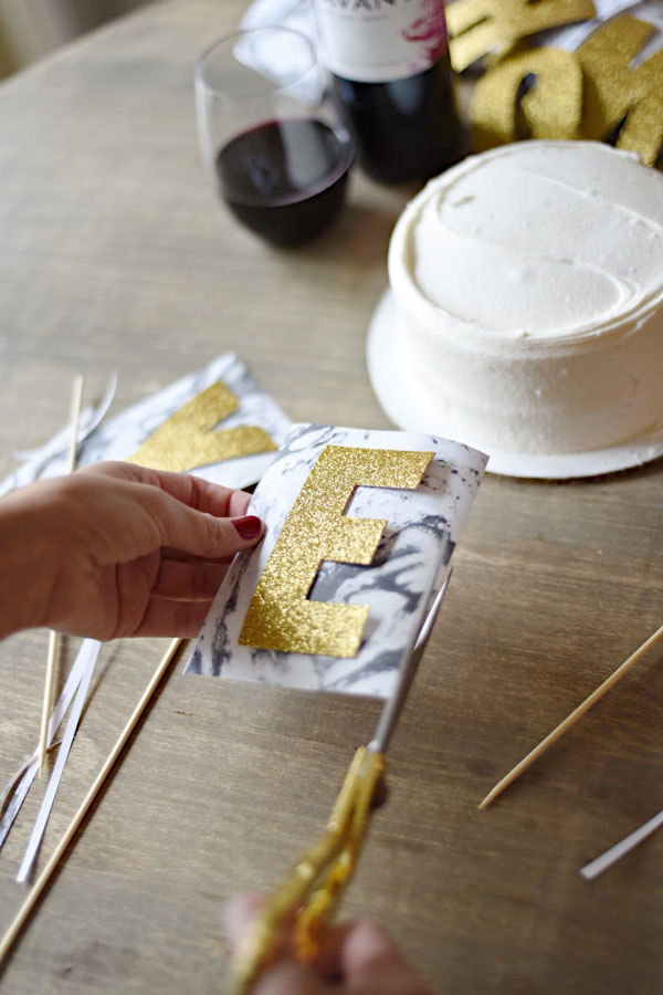 Wildly easy to make & super fun to customize, this New Year's Eve Cake Topper DIY is perfect for almost every occasion!