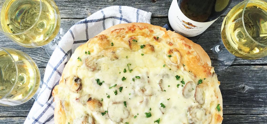 Today, it's all about pizza. And not just any pizza, this is a recipe for White Pizza with Chicken, Mushrooms and Mozzarella. A recipe that is perfect when served up with a glass of Kendall-Jackson Vintner’s Reserve Chardonnay.