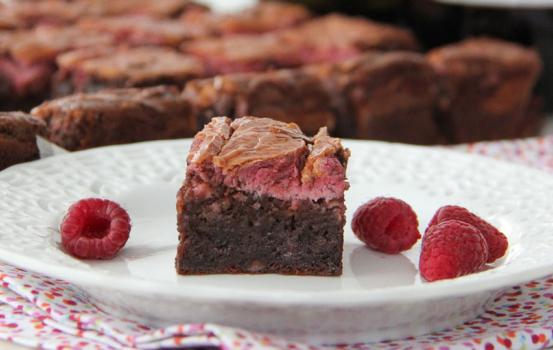 This delicious Raspberry Cheesecake Swirl Brownie recipe is the ultimate chocolate dessert, sure to satisfy even the biggest sweet-tooth.