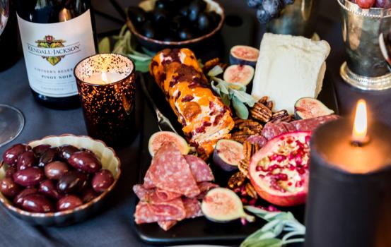 Between the witches, goblins and bats there’s still plenty of fun in a bottle of wine and a decadent, Spooky Halloween Wine & Cheese Board for your friends.