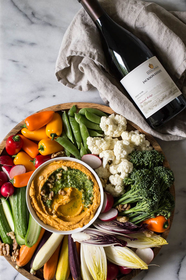 This sweet potato hummus with kale pesto &amp; fall crudités recipe is not only seasonal and delicious, but also simple to pull together.